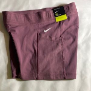 THE NIKE PRO
TIGHT FIT SIZE MEDIUM